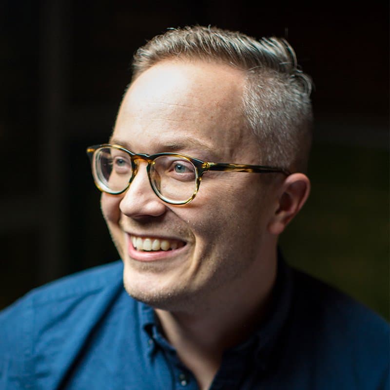 Portrait of Caleb Gardner Managing Partner 18 Coffees